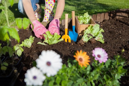 Satisfied customer enjoying a cleared garden in Barking
